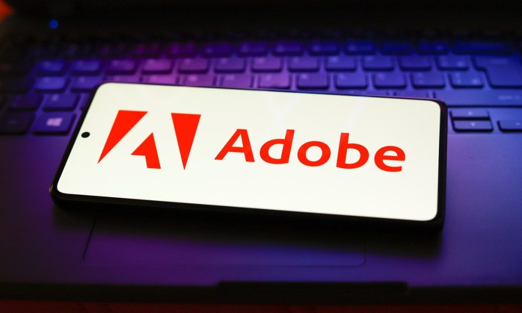 Adobe logo on a screen as authors file a class-action lawsuit alleging SlimLM AI was trained on pirated books via the SlimPajama and Books3 datasets