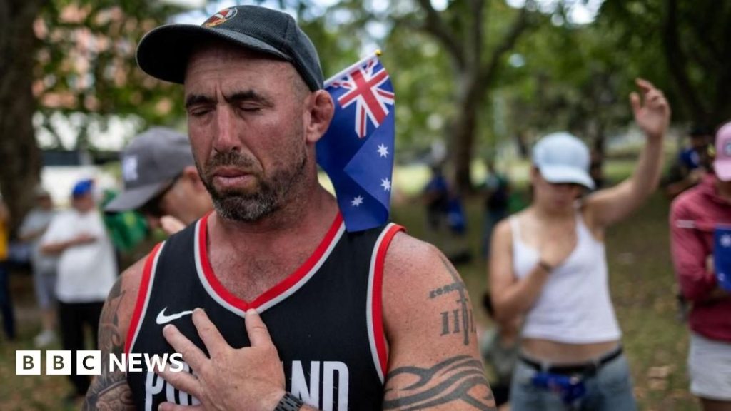 Mourners gathered at Bondi Beach in Sydney during Australia’s national day of reflection, observing a minute’s silence for the victims of the terrorist attack