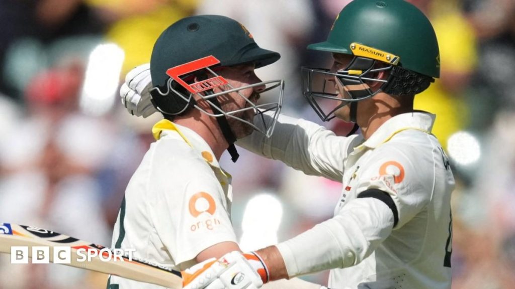 Travis Head celebrates his century for Australia against England in the third Ashes Test in Adelaide