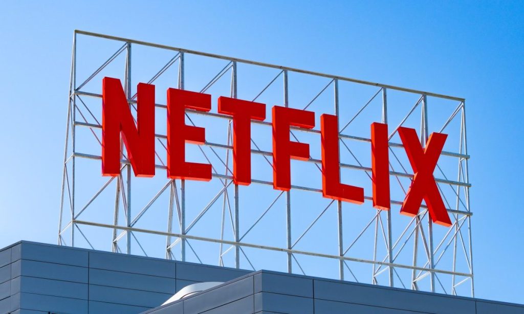 A symbolic illustration of a startup's growth from DVDs to an entertainment empire.