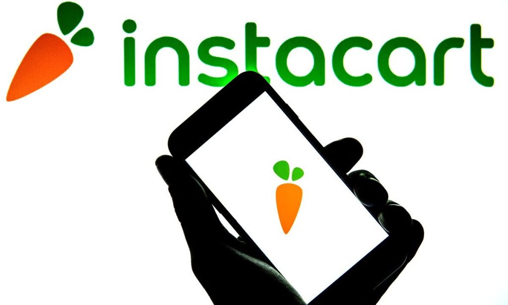 Instacart logo on a smartphone screen as the FTC announces a $60 million consumer refunds settlement over deceptive advertising and refund practices