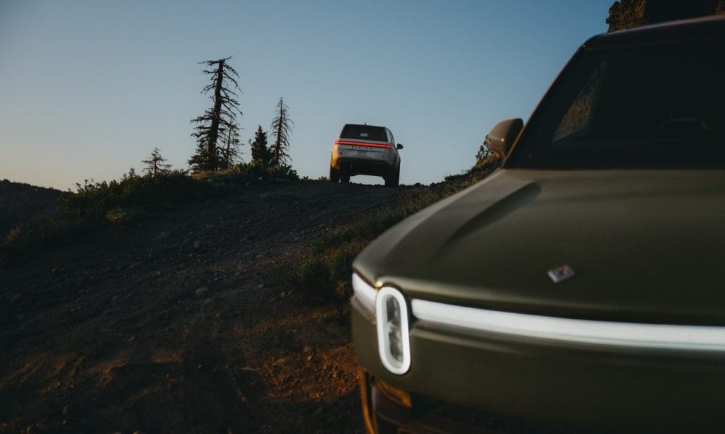 Rivian logo displayed on a building as former Patagonia CEO Rose Marcario resigns from Rivian’s board ahead of the R2 SUV launch