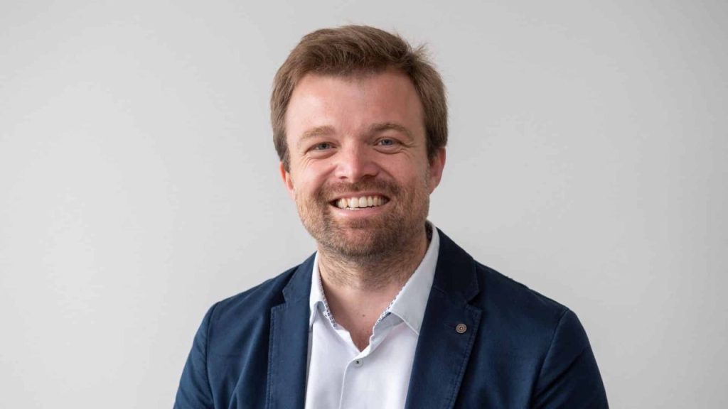 Artist’s impression of SWISSto12 HummingSat compact geostationary satellite in orbit above Earth