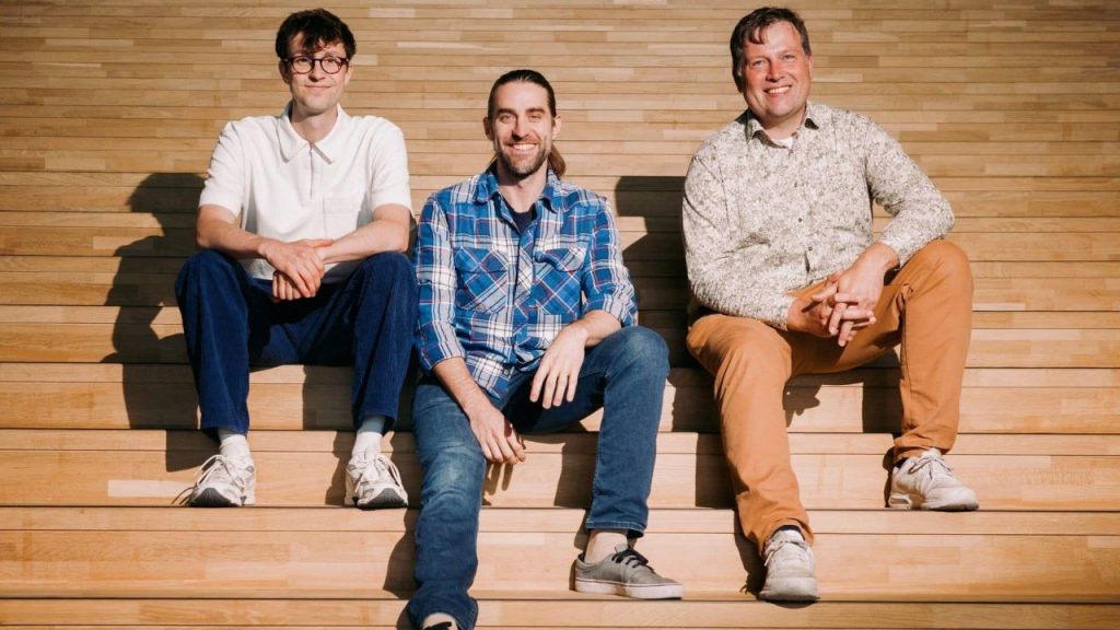 Founders of German synthetic data startup simmetry.ai discussing AI training datasets in a modern office