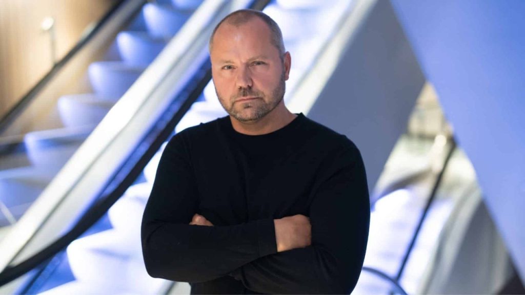 Business clients using a music-for-business streaming platform inside a modern retail and hospitality environment