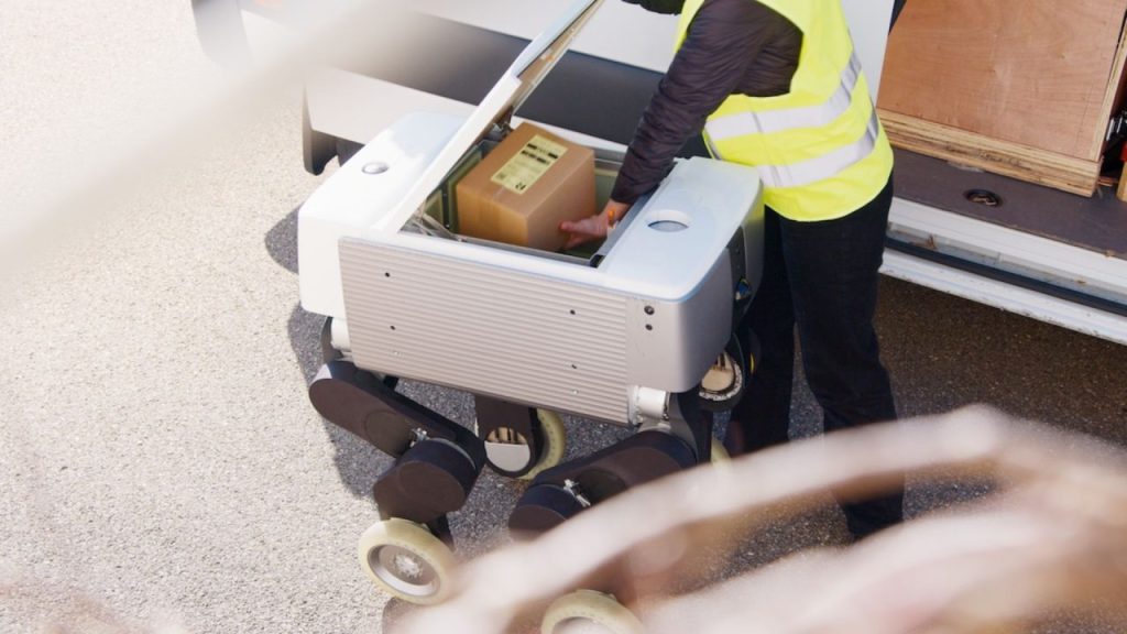 Stair-climbing delivery robot operating on an apartment building staircase in Zurich