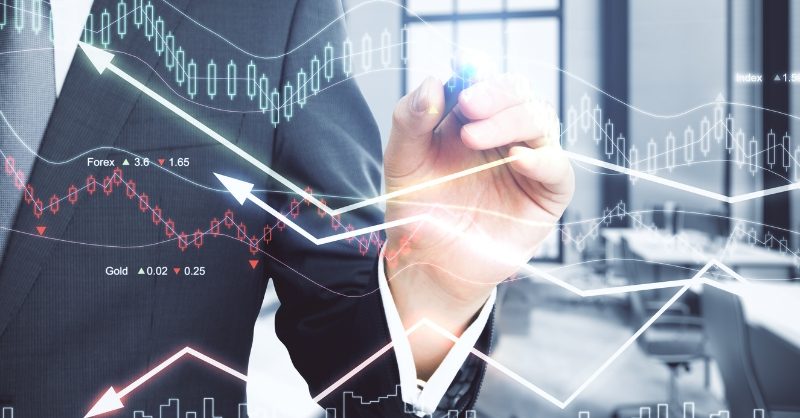 Financial Consultants Help Businesses Navigate Tough Decisions Financial consultant discussing strategy and data with a business client in an office setting