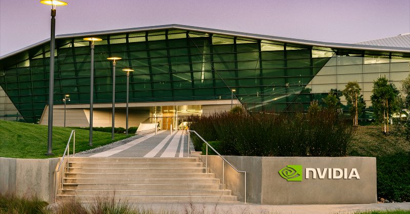 Nvidia backs Lumentum with $2B laser deal for AI factories Nvidia and Lumentum logos overlaid on an AI data center with optical networking lasers