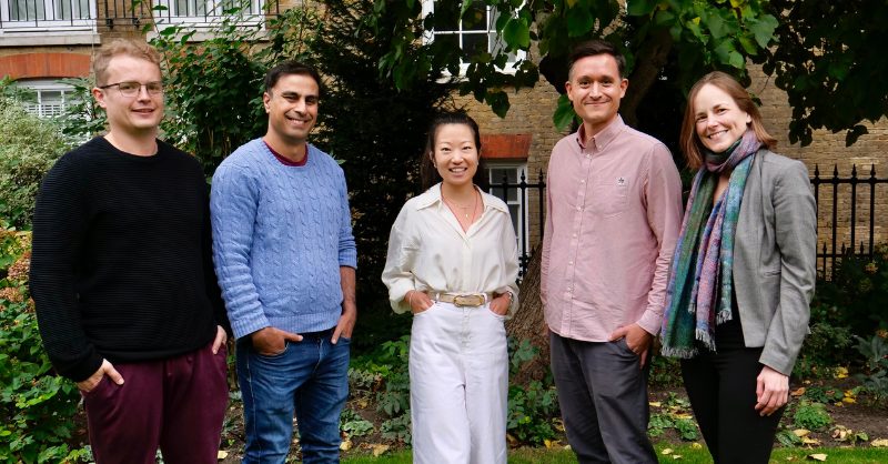 Outpost Bio’s $3.5M Bet: Turning the Microbiome Into AI Infrastructure Scientists working with microbiome samples and AI data visualizations on screens in a modern laboratory