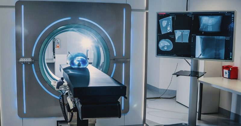 RAYDIAX Secures €7.5M to Trial CT Scanner in Cancer Care Therapy CT scanner being used in a modern oncology treatment room