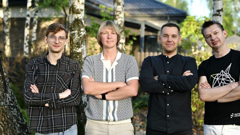 Founders of WhiteBridge AI discussing their AI-powered people research engine in a modern Vilnius office