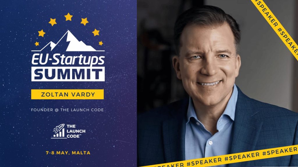 Sales and GTM advisor Zoltan Vardy speaking on stage at a European startup summit