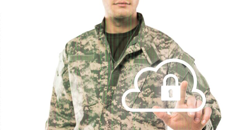 Defence Tech Startups Draw Investors From Drones to Armour Defence technology engineer testing a military drone next to modern body armour in a research facility