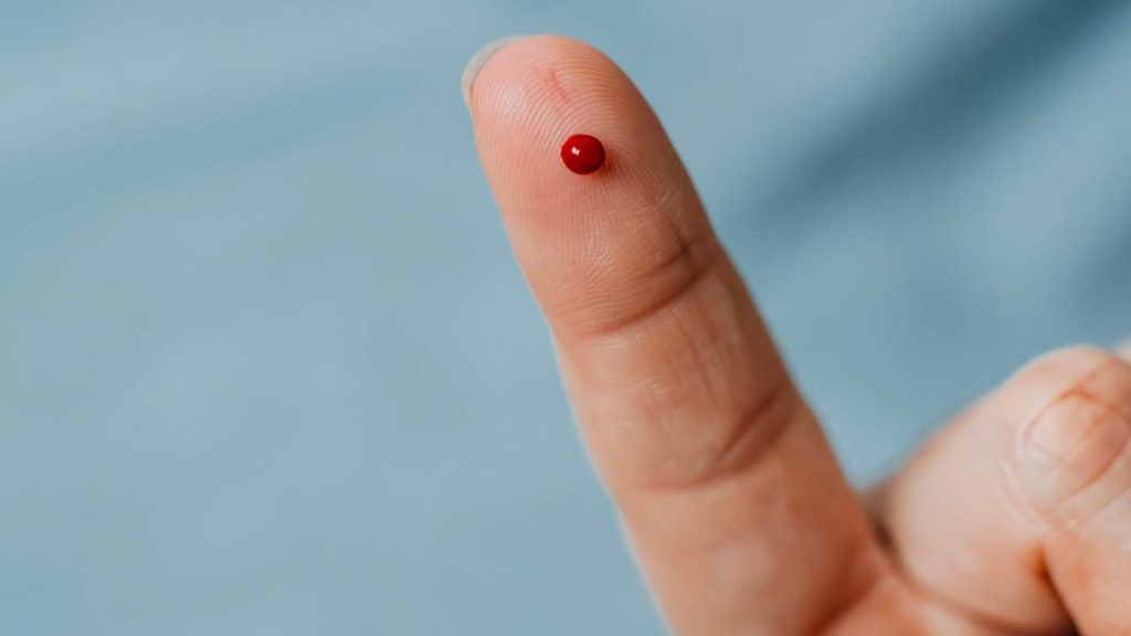 A healthcare professional analyzing data with advanced technology.