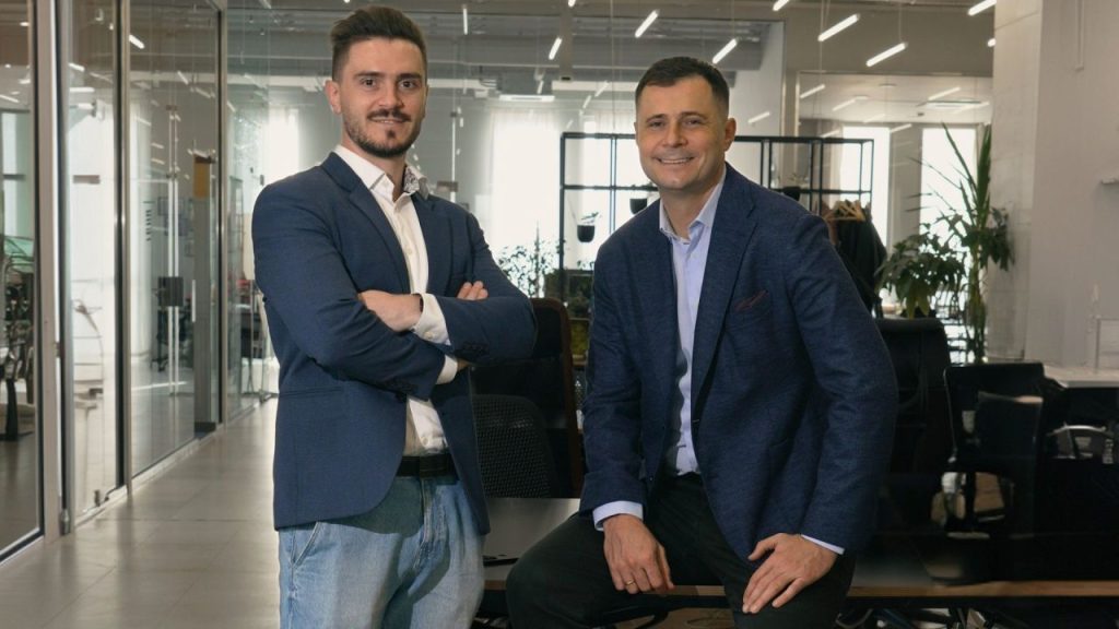 Founders of Sofia-based startup nFuse discussing AI-powered ordering technology in a modern office
