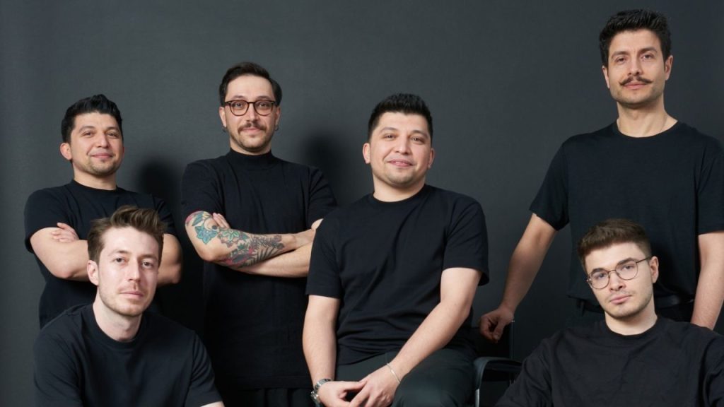 Replenit raises €2.1M to build AI decision engine for retail Replenit team working on an AI retail decision engine in a modern Warsaw office