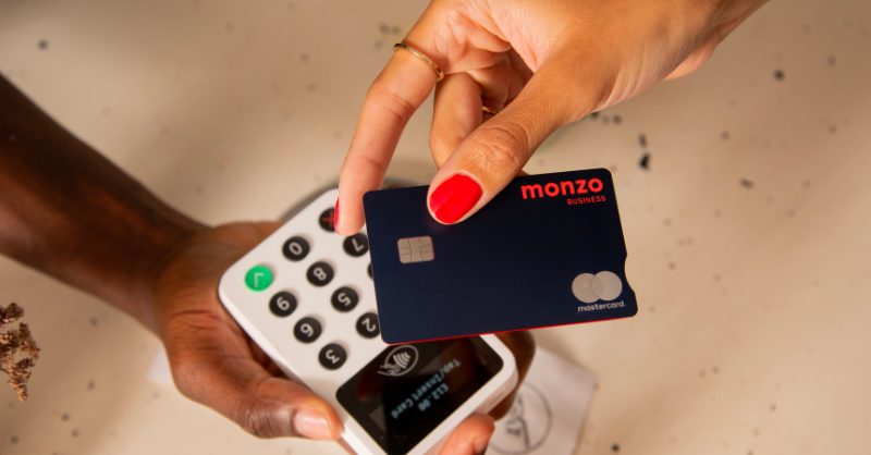 Monzo Shifts Focus to Europe, Eyes £1B Profit Growth Monzo logo with a financial graph background
