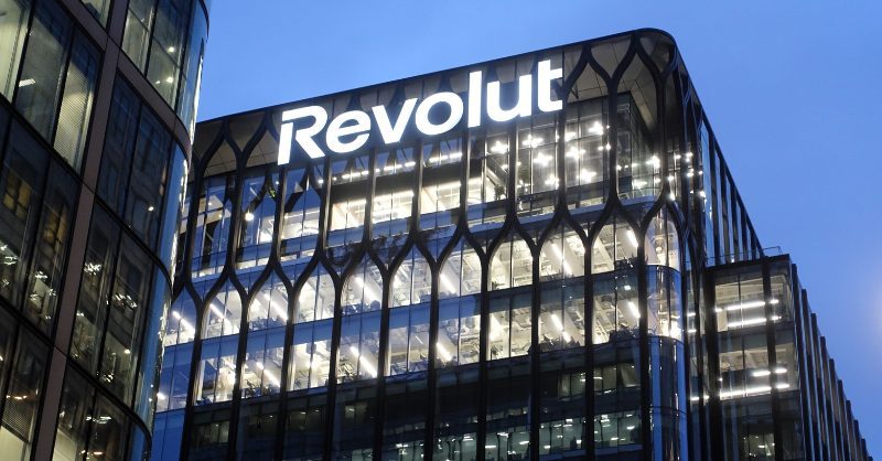 Nvidia Invests $196M in Revolut to Boost Fintech AI Capabilities Nvidia logo displayed next to a Revolut banking interface on a smartphone screen.